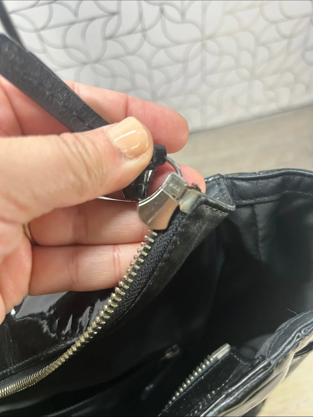 Coach black patent leather zip top tote bag
